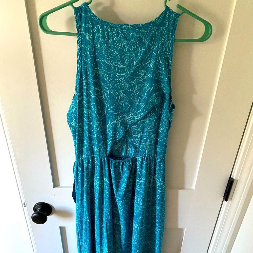 Sunset dress brand new never worn! color is the blue color seen in the photos.